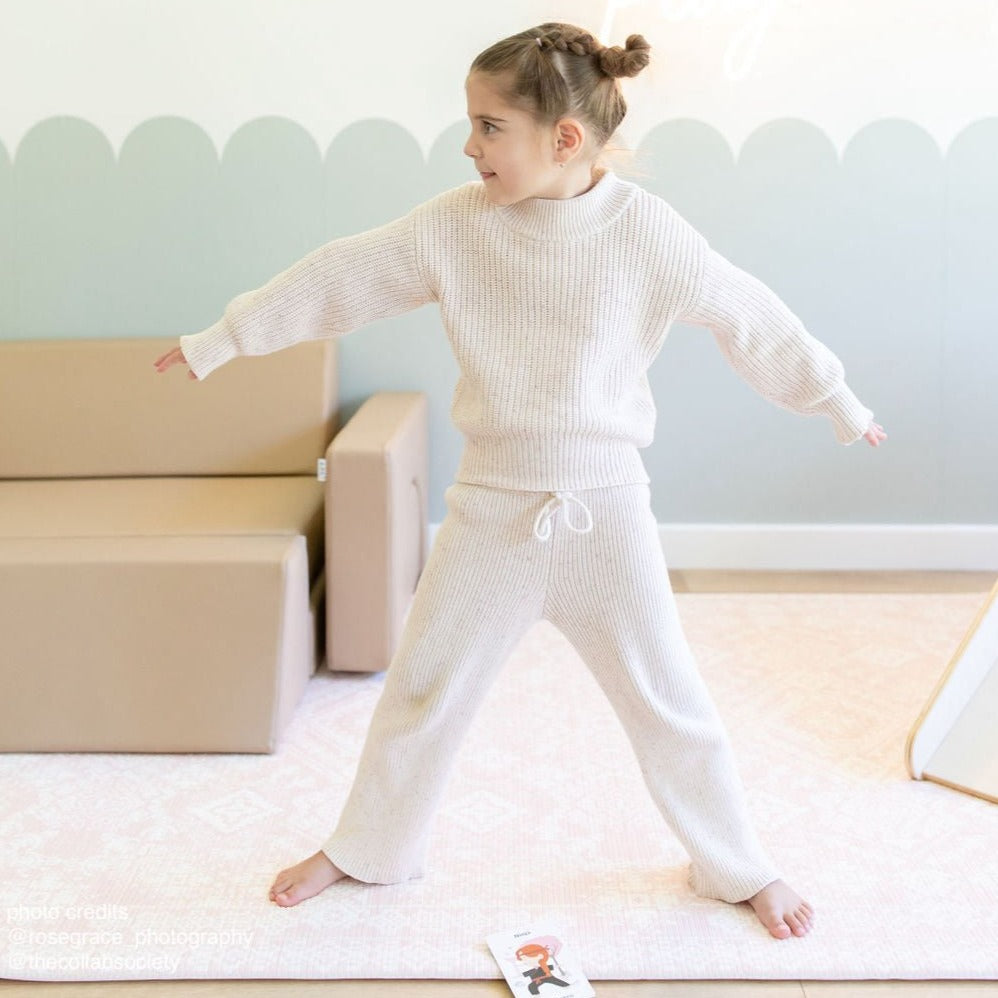 Cute Girl Doing Ninja Yoga